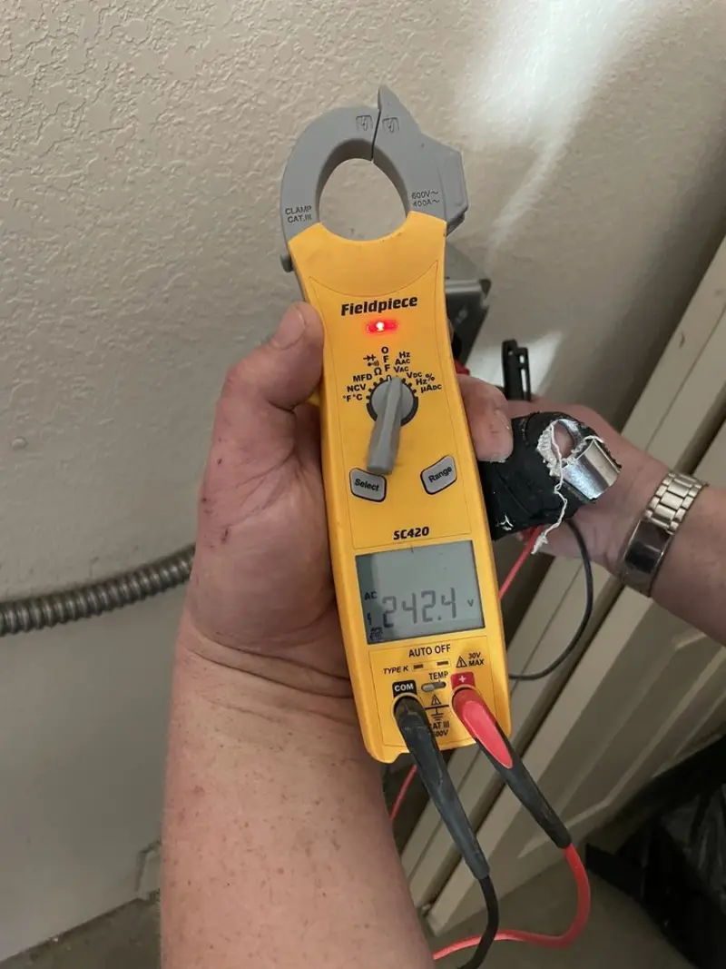 Voltage testing with clamp meter during Hot Tub / Pool Electrical Wiring in Millersburg